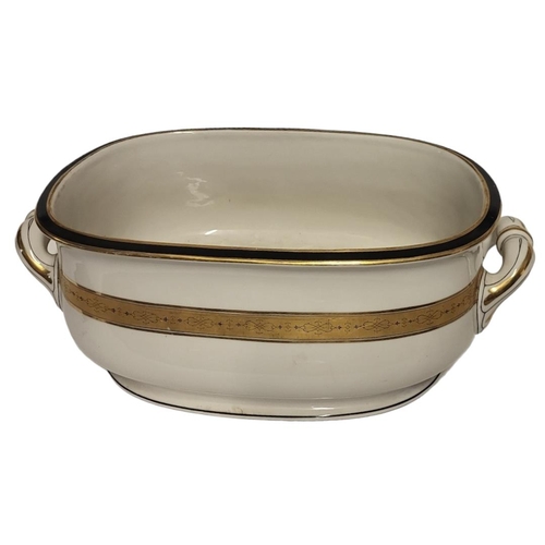 304 - A 19TH CENTURY POTTERY FOOTBATH
Twin handles with black and gilt decoration, impressed mark ‘LS234’.... 