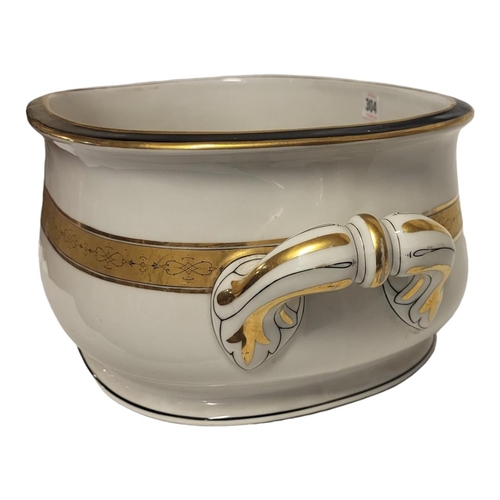 304 - A 19TH CENTURY POTTERY FOOTBATH
Twin handles with black and gilt decoration, impressed mark ‘LS234’.... 