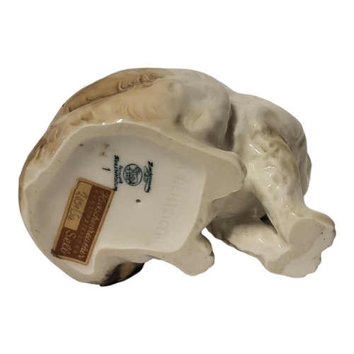 311 - H. ACHTZIGER FOR HUTSCHENREUTHER OF SELB, A HARD PASTE PORCELAIN MODEL OF A YOUNG CAT
Seated positio... 