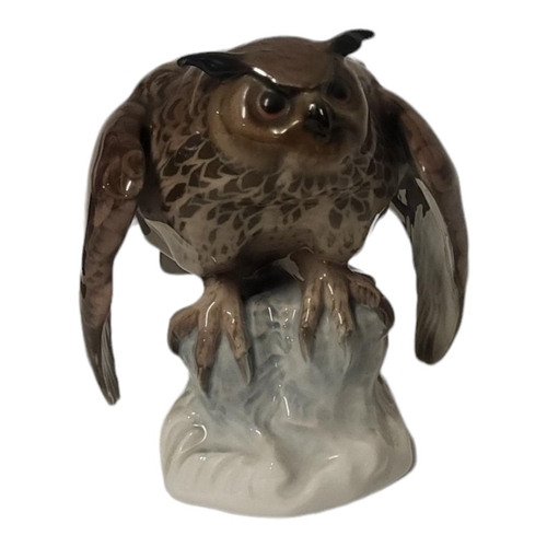 312 - E. OTTO FOR BAVARIAN ROSENTHAL FACTORY, A HARD PASTE PORCELAIN MODEL OF A BLACK FOREST WISE OWL
On a... 