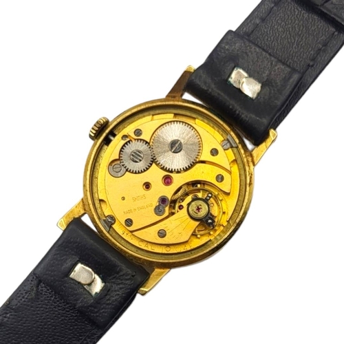 33 - SMITHS, EVEREST, A 1950’S YELLOW METAL CASED GENT’S SLIM WRISTWATCH
Having a gold tone dial, Arabic ... 