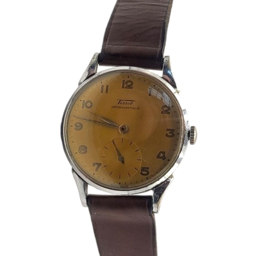 34 - TISSOT, ANTIMAGNETIQUE, A 1950’S SWISS STAINLESS STEEL GENT’S 
Having a textured light brown dial, R... 