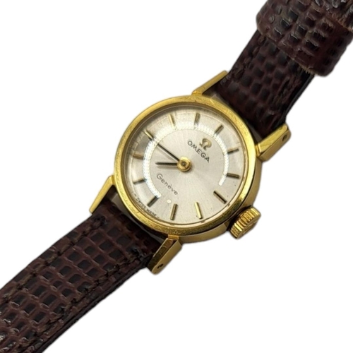 35A - OMEGA, A VINTAGE GOLD PLATED LADIES’ WRISTWATCH
Having a silver tone dial and burgundy leather strap... 