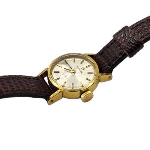 35A - OMEGA, A VINTAGE GOLD PLATED LADIES’ WRISTWATCH
Having a silver tone dial and burgundy leather strap... 