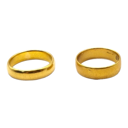 37 - A SET OF TWO EARLY 20TH CENTURY GENT’S 22CT PLAIN GOLD WEDDING BANDS
Fully marked.
(size M/N)