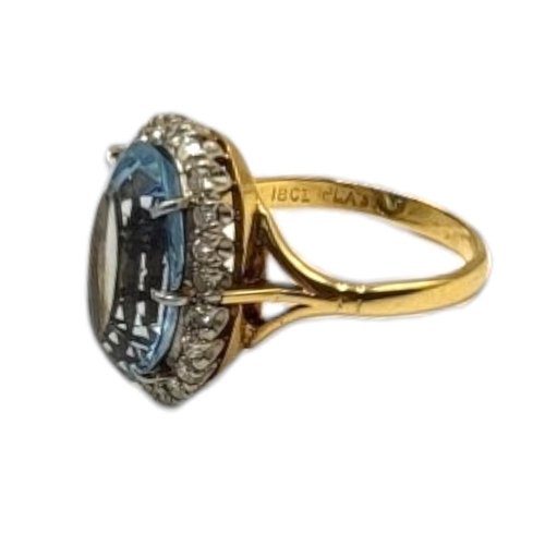 42 - AN EARLY 20TH CENTURY ATTRACTIVE 18CT GOLD AND AQUAMARINE LADIES’ DRESS RING
The oval fancy brillian... 