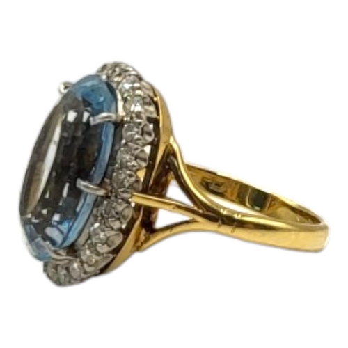 42 - AN EARLY 20TH CENTURY ATTRACTIVE 18CT GOLD AND AQUAMARINE LADIES’ DRESS RING
The oval fancy brillian... 