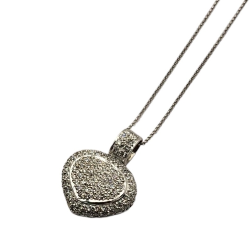 47 - AN 18CT WHITE GOLD AND DIAMOND HEART PENDANT NECKLACE
Having pavé set diamonds in a hollow pierced d... 