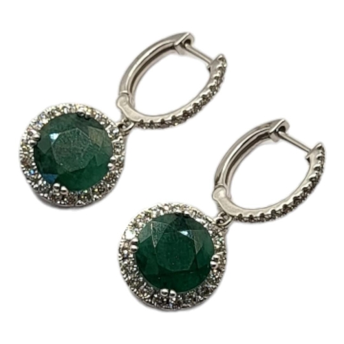 49 - A PAIR OF 18CT WHITE GOLD, EMERALD AND DIAMOND EARRINGS
The faceted round cut emerald edged with dia... 