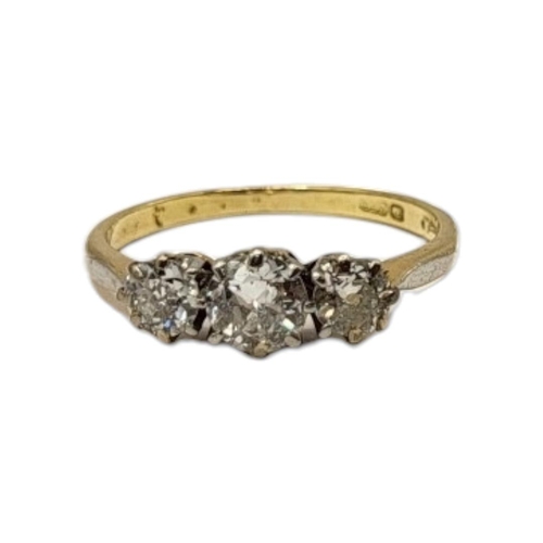 4A - AN 18CT GOLD AND DIAMOND THREE STONE RING 
Having a single row of round  cut diamonds.
(approx total... 