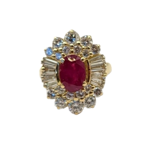 50 - AN 18CT GOLD, RUBY AND DIAMOND CLUSTER RING
The central oval cut ruby,edged with baguette and round ... 