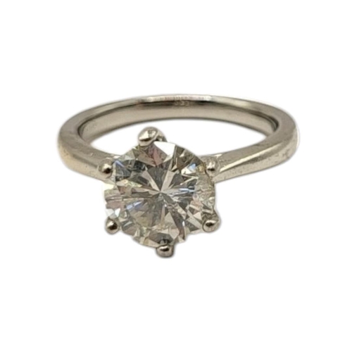 53 - A VINTAGE PLATINUM AND DIAMOND SOLITAIRE RING
Set with a single round cut diamond in a plain mount.
... 