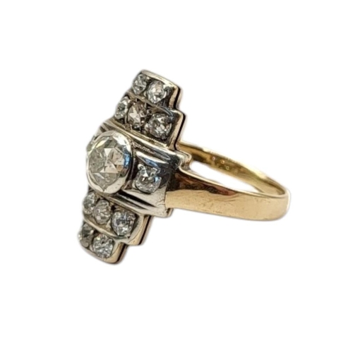 59 - AN ART DECO 18CT GOLD, DIAMOND CLUSTER RING
The central round cut diamond flanked by two rows of dia... 