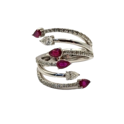 60 - AN 18CT WHITE GOLD, RUBY AND DIAMOND CLUSTER RING
Four pear cut rubies interspersed with diamonds in... 