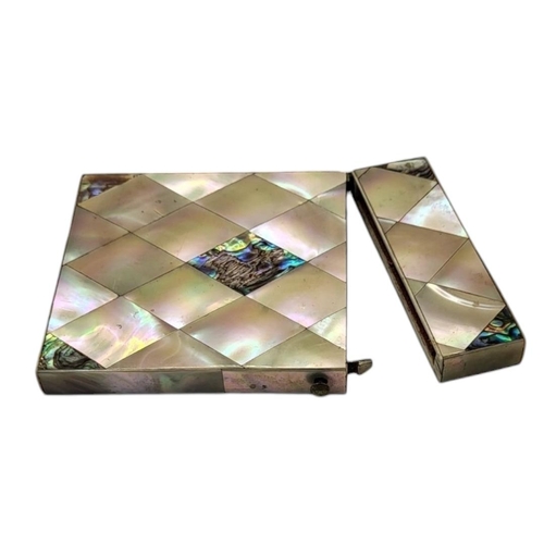 7 - A VICTORIAN MOTHER OF PEARL AND PAPUA SHELL RECTANGULAR CALLING CARD CASE
With hinge lid.
(approx 10... 