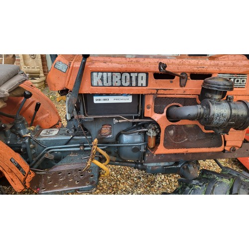 500 - A VINTAGE B7100 KUBOTA COMPACT TRACTOR
Diesel, with grass cutter trailer.

Condition: in working ord... 