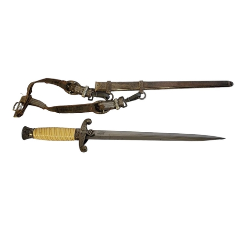 388 - POSSIBLY CARL EICHHORN, A GERMAN NAZI TENTO ARMY OFFICER’S DAGGER
Scabbard in copper flashcoat, the ... 