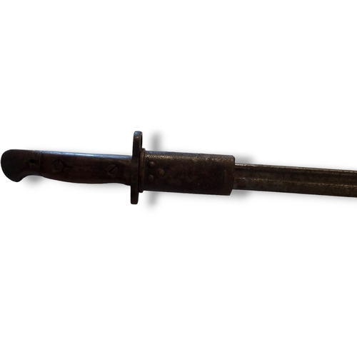 389 - TWO EARLY 20TH CENTURY BAYONETS
A 1907 Wilkinson Bayonet with carved wooden handle and AN ebonised b... 