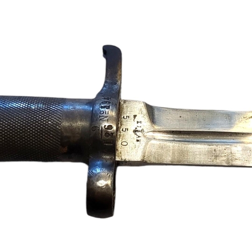 390 - AN EARLY 20TH CENTURY SWEDISH ARMY BAYONET
Having a textured steel handle ,the steel blade marked EK... 