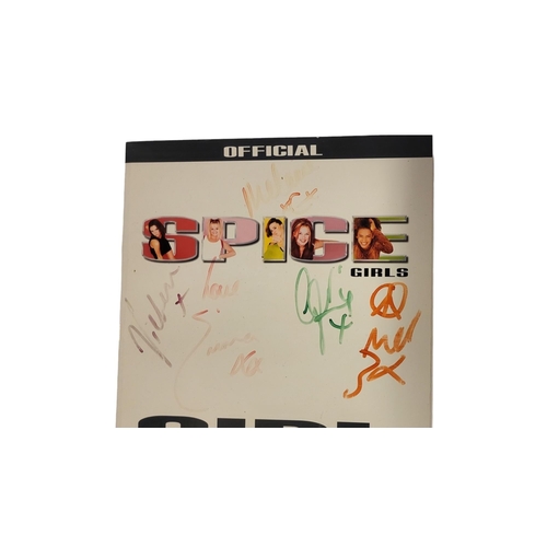 153A - A SIGNED COPY OF THE 1997 OFFICIAL ‘GIRL POWER!’ PUBLICATION BY THE SPICE GIRLS
All five signatures ... 