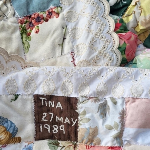 162A - A 20TH CENTURY AMERICAN COTTON PATCHWORK QUILT
The arrangement of small quilted panels and embroider... 