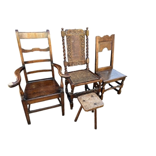 584 - A 19TH CENTURY OAK OPEN ARMCHAIR
With swept arms and solid seat, along with an 18th Century standard... 