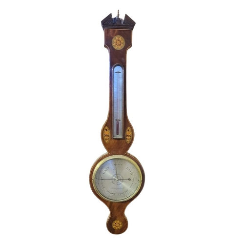 590 - A. GUARNERIO OF HUNTINGDON, A 19TH CENTURY MAHOGANY AND MARQUETRY INLAID WHEEL BAROMETER
The archite... 