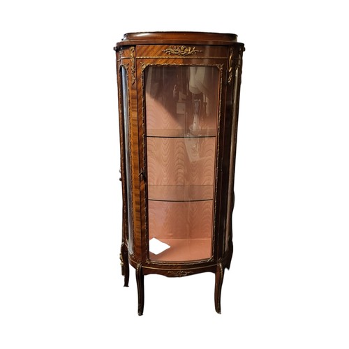 596 - A LOUIS XVI REVIVAL MAHOGANY AND BRONZE MOUNTED VITRINE 
With caddy top above single door enclosing ... 