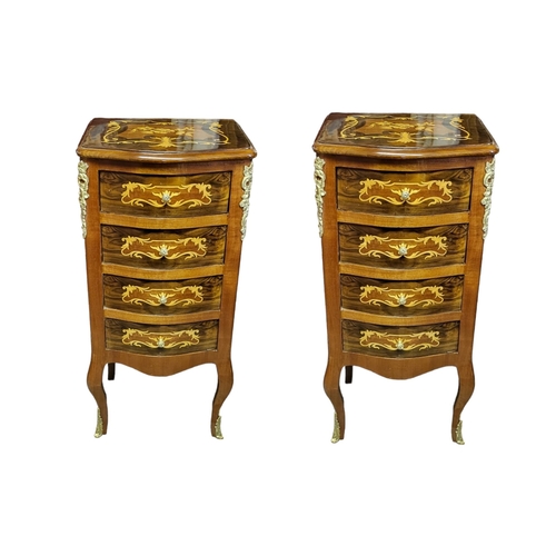 597 - A PAIR CONTINENTAL WALNUT, MAHOGANY AND MARQUETRY INLAID BOW FRONTED PEDESTAL CHEST 
Having an arran... 