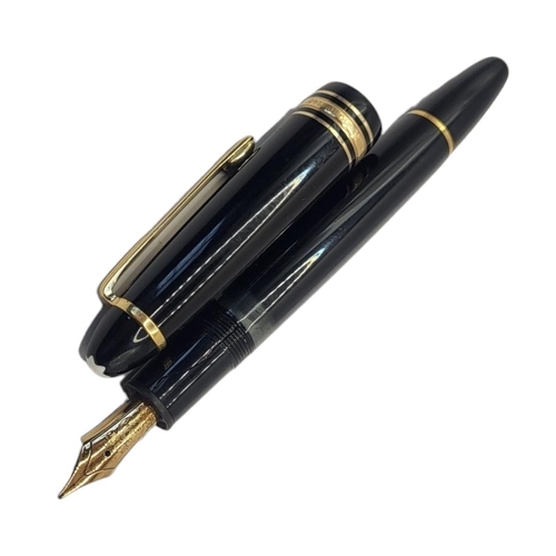 114 - WITHDRAWN MONTBLANC, A VINTAGE FOUNTAIN PEN
Black case with gilt mounts, marked ‘Meisterstruck no 14... 