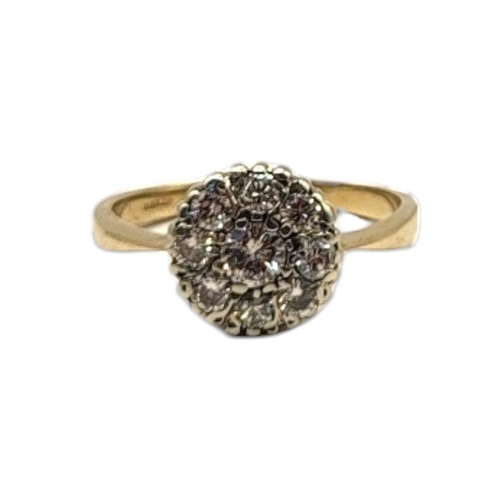 11A - A VINTAGE 9CT WHITE GOLD AND DIAMOND CLUSTER RING
Having an arrangement of round cut diamonds.
(appr... 