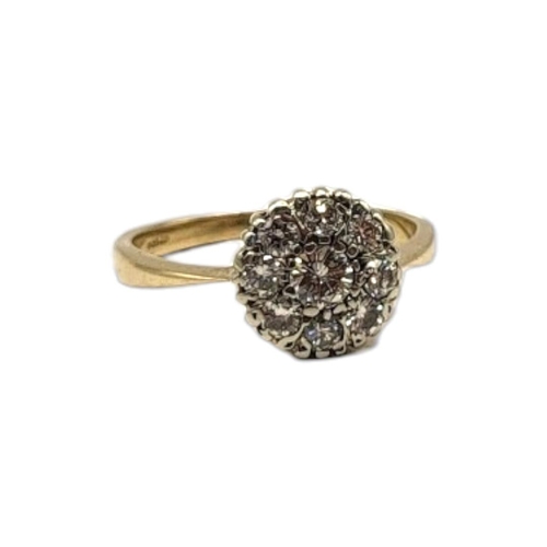 11A - A VINTAGE 9CT WHITE GOLD AND DIAMOND CLUSTER RING
Having an arrangement of round cut diamonds.
(appr... 