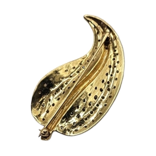 12A - A 14CT GOLD AND DIAMOND LEAF FORM BROOCH 
Having an arrangement of graduated round cut stones in a P... 