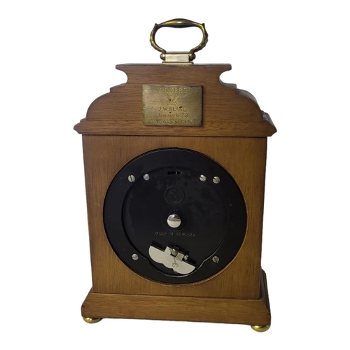 155 - ELLIOT FOR GARRARD AND CO., A VINTAGE OAK AND BRASS MANTEL CLOCK 
Having a brass carry handle, silve... 