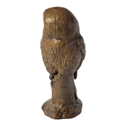 180 - A 20TH CENTURY BRONZE OWL
Having engraved decoration, initialled 'PS' to filled base.
(approx 18cm)
... 