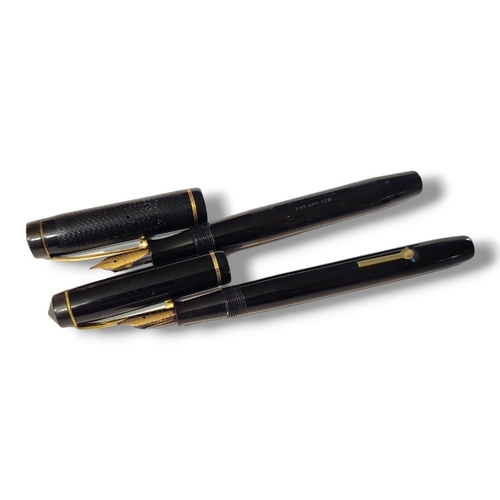 21 - MENTMORE, A VINTAGE FOUNTAIN PEN
Having gold plated mounts and textured black case, together with a ... 