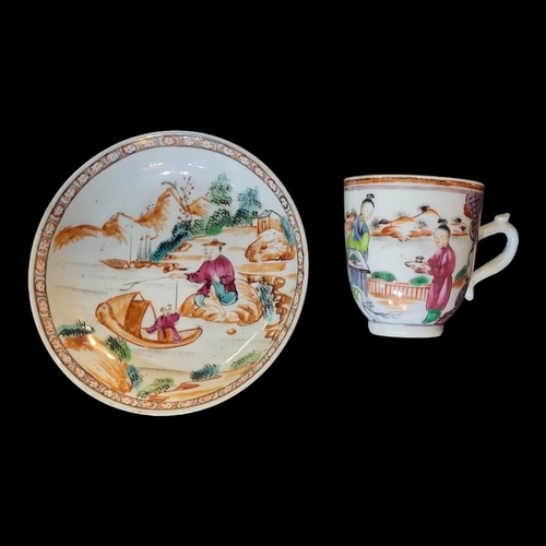 220 - A CHINESE 18TH CENTURY HARD PASTE PORCELAIN FAMILLE ROSE PORCELAIN EXPORT CUP AND SAUCER 
Painted wi... 