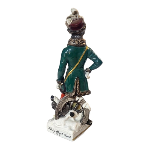 222 - ROYAL NAPLES, A PORCELAIN MODEL OF NAPOLEONIC MILITARY OFFICER
Wearing regimental green coatee parti... 