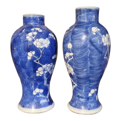 226 - TWO EARLY 20TH CENTURY CHINESE BLUE AND WHITE PORCELAIN VASES
Hand painted decoration of prunus spri... 