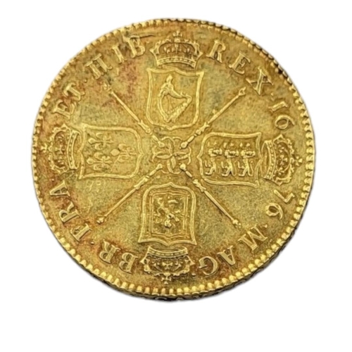 27 - A KING CHARLES II, 1668 - 1678, A 22CT GOLD FIVE GUINEA COIN, DATED 1676
With portrait with laureate... 