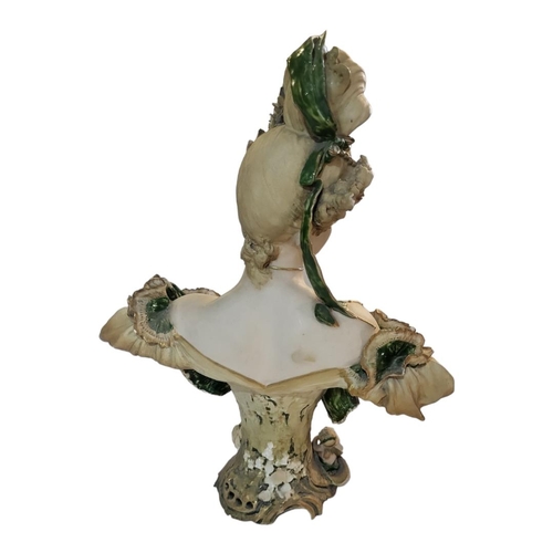 290 - AN EARLY 20TH CENTURY ART NOUVEAU AUSTRIAN WIEN TEPLIZ PORCELAIN BUST OF A LADY
With cherub at base.... 