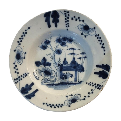 296 - AN 18TH CENTURY ENGLISH TIN GLAZED DELFTWARE BLUE AND WHITE PLATE 
In chinoiserie design, Bristol, C... 