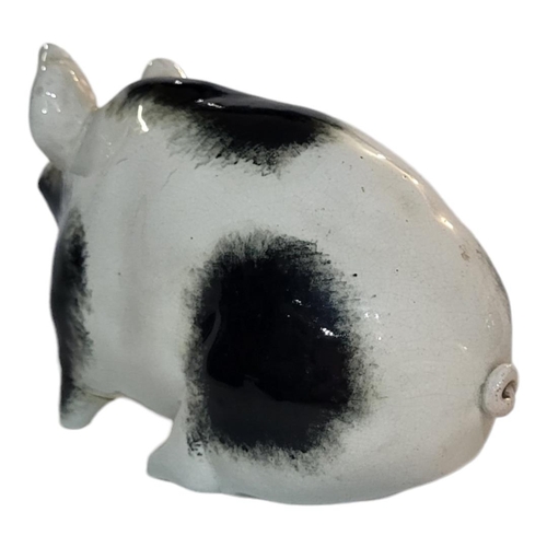 298 - WITHDRAWN AN EARLY 20TH CENTURY WEMYSS POTTERY MODEL OF A PIG
Sponged black and white decoration, Ci... 