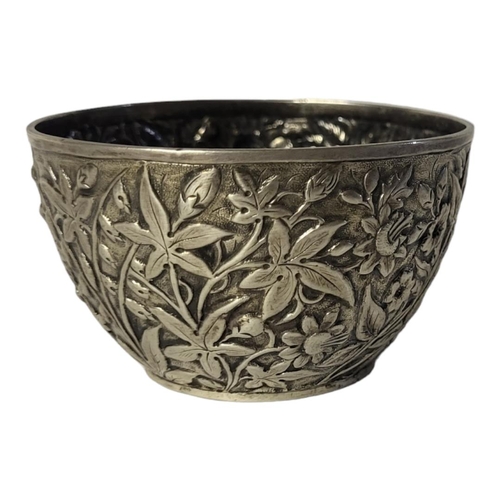 31 - A VICTORIAN SILVER SUGAR BASIN
Having embossed floral decoration, hallmarked Birmingham, 1887.
(appr... 