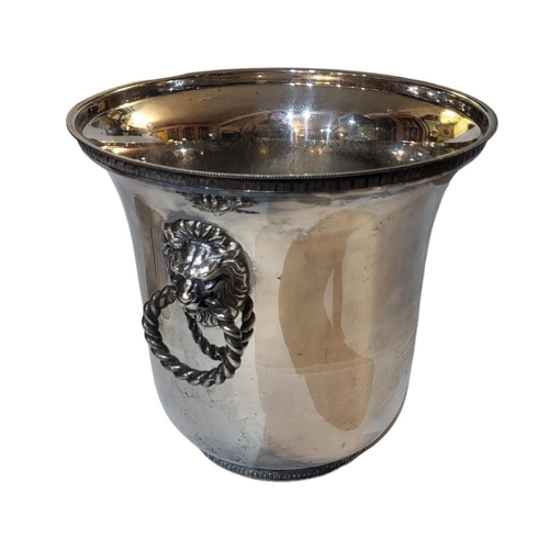 320 - WITHDRAWN!!

VEUVE CLICQUOT, A VINTAGE SILVER PLATED ICE BUCKET
Having twin lion mask handles and en... 