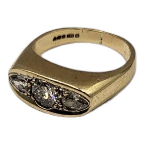 36 - A VINTAGE 9CT GOLD AND DIAMOND THREE STONE RING
The central round cut diamond flanked by two marquis... 