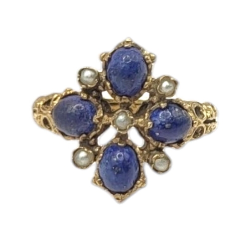 39 - A VINTAGE 9CT GOLD LAPIS LAZULI AND SEED PEARL RING
Having an arrangement of cabochon cut stones int... 