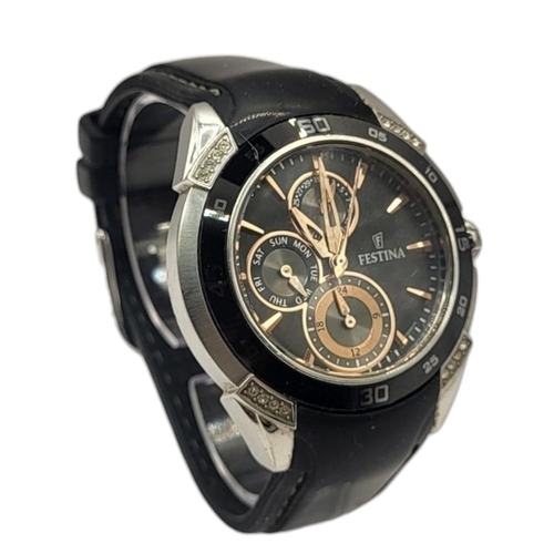 45 - FESTINA, A CERAMIC AND STAINLESS STEEL GENT’S CHRONOGRAPH WRISTWATCH
Having a black tone ceramic bez... 