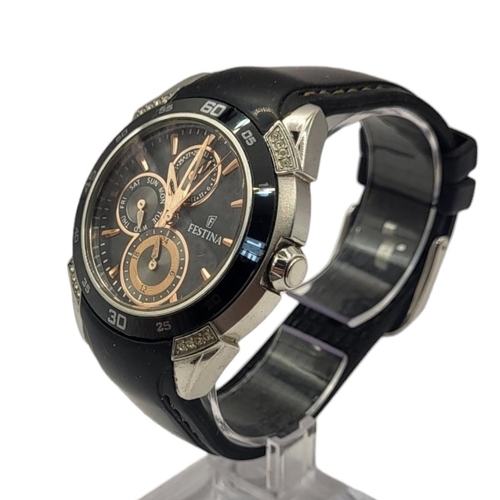 45 - FESTINA, A CERAMIC AND STAINLESS STEEL GENT’S CHRONOGRAPH WRISTWATCH
Having a black tone ceramic bez... 