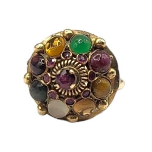 47 - A VINTAGE 14CT GOLD AND MULTI GEM SET TUTTI FRUTTI RING
Having an arrangement of cabochon cut stones... 